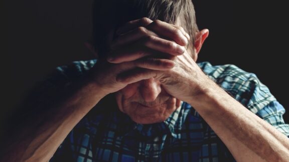 A worried man, concerned about the signs of Alzheimer's