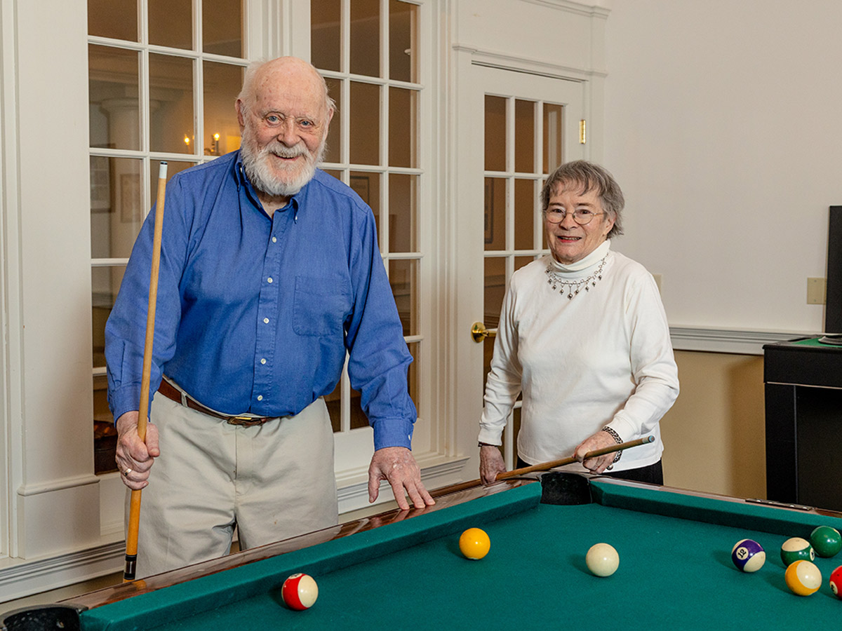 Commonwealth Senior Living at Haddam Couple Playing Pool