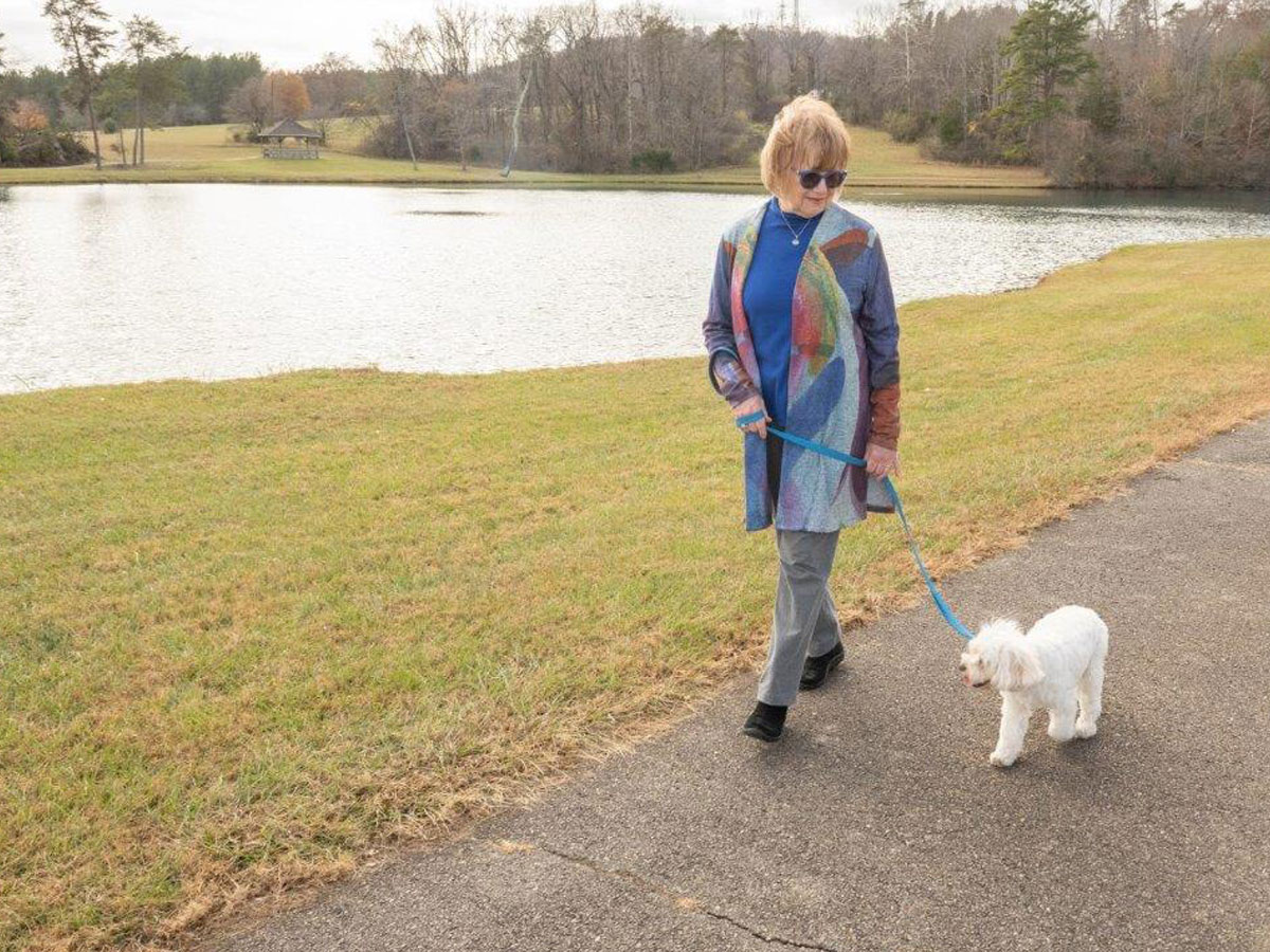King's Grant Lady Walking Dog