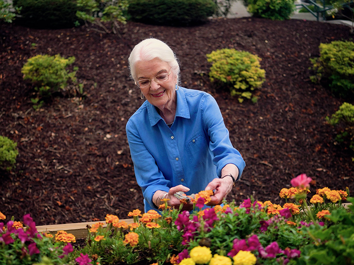Summit Square Lady Gardening