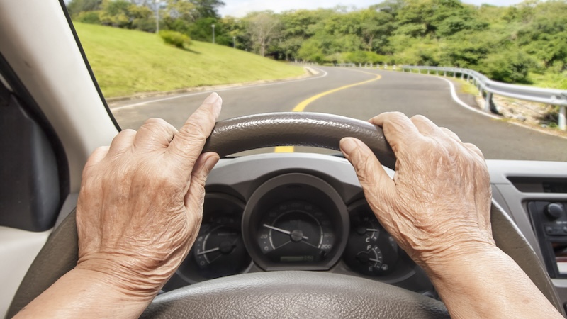 A friend's driving skills are wavering on a country road.