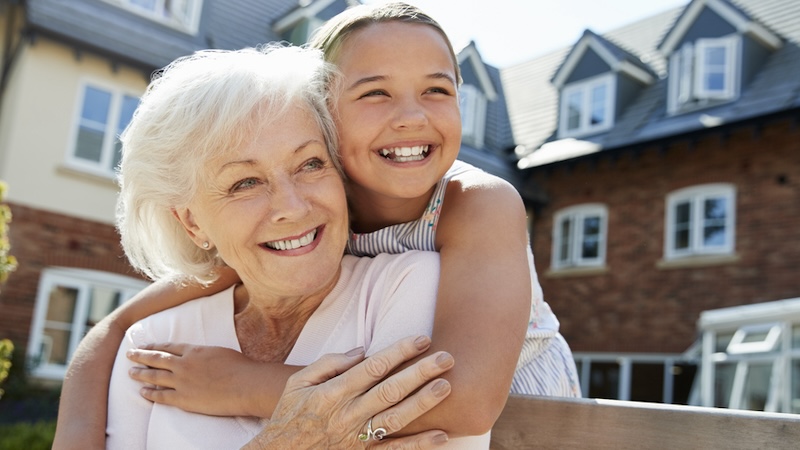 A senior woman and her granddaughter - if anything happens to the granddaughter's parents, can someone under 55 live in a 55+ community, the woman may wonder. Image by Monkey Business Images.