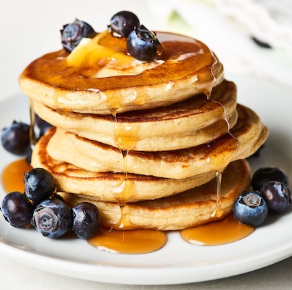 high-protein pancakes stacked high!