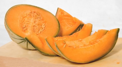 Sliced cantaloupe ready for a chilled cantaloupe soup.
