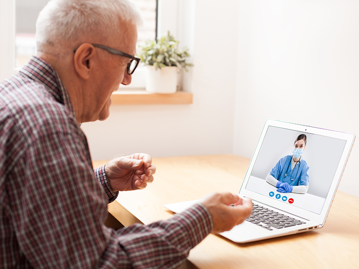 Alma Wellness Group Elderly Man with Doctor on Video Call