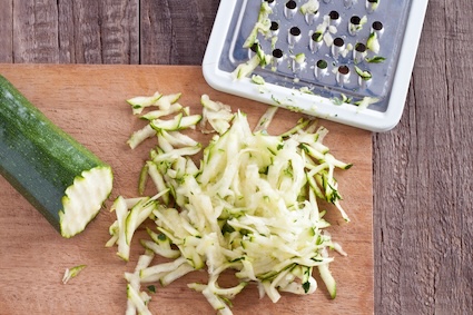 Shredded zucchini ready for a chocolate zucchini bread recipe.