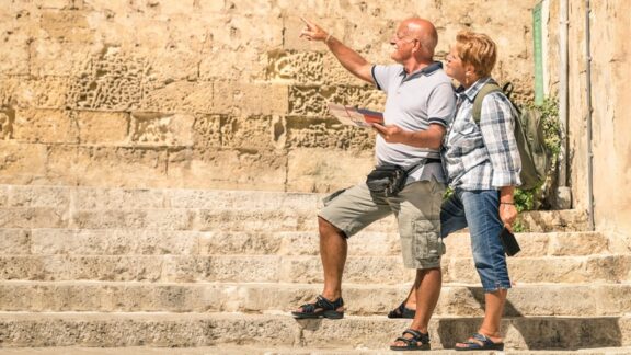 Travel for seniors can be near or far, including this couple's trip to the old town of La Valletta. Image by Mirko Vitali