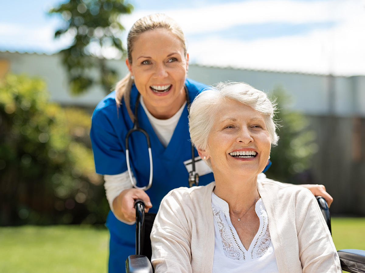 LiveWell Home Care Senior Lady in Wheelchair with Nurse