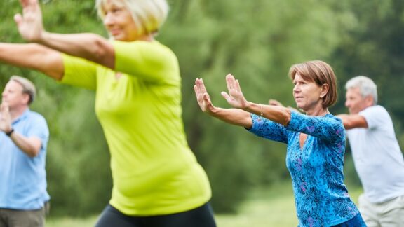 A group of seniors doing tai chi