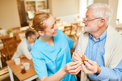 After realizing it's time for assisted living, a man finds his place in a nursing home. Image by Robert Kneschke