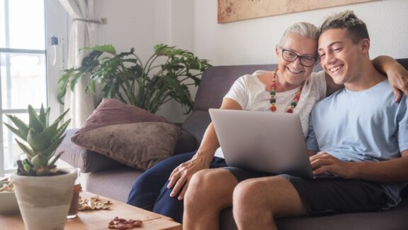 Grandmom advocating for her grandson on computer.