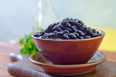 Bowl of black beans, a great source of protein in a high-protein breakfast.