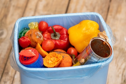 Fruits and vegetables in a trash can