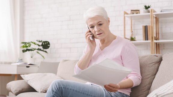 Worried senior woman finding that the 2026 Social Security is insufficient to meet her budget needs