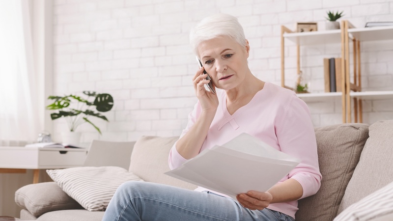 Worried senior woman finding that the 2026 Social Security is insufficient to meet her budget needs