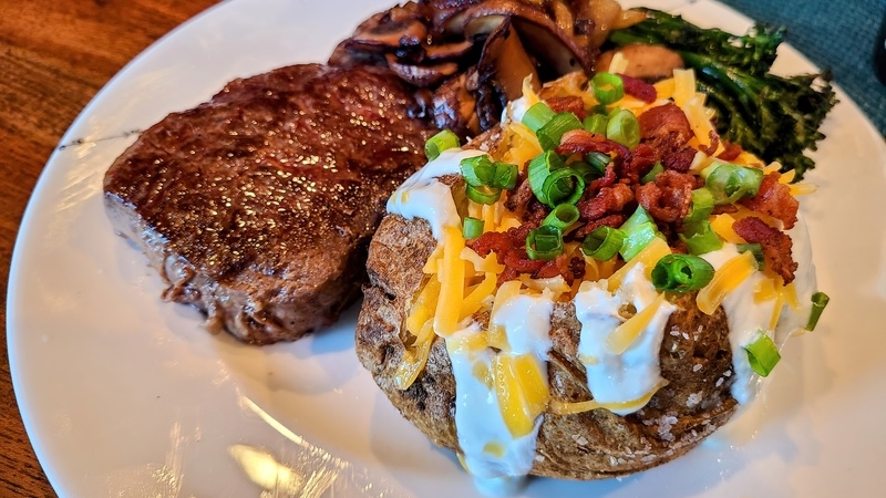 A steak dinner for a senior not afraid of eating fat.