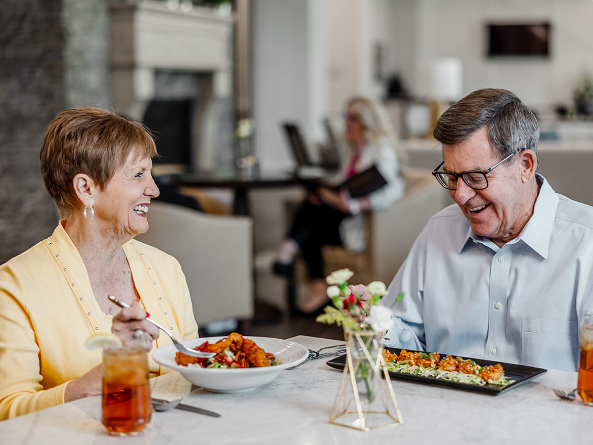 Cambridge Village at Brier Creek Couple Eating Lunch