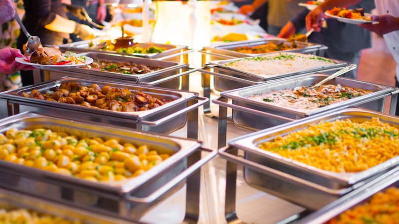A bunch of food as part of a buffet