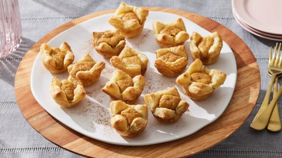 Mini pumpkin cheescakes on a plate