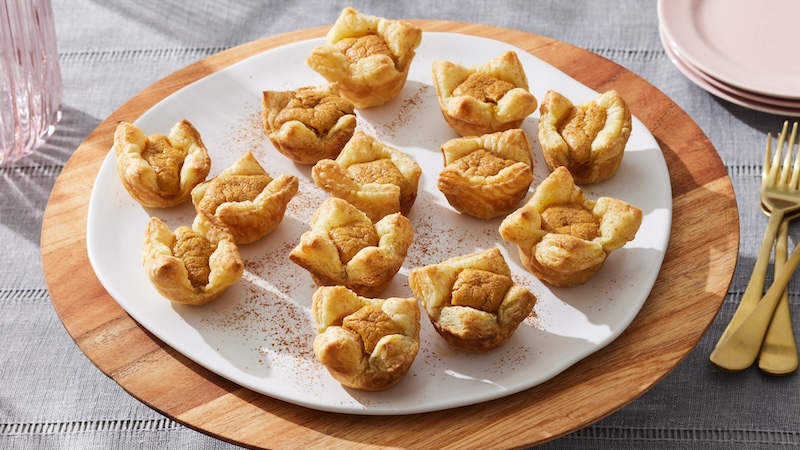 Mini pumpkin cheescakes on a plate
