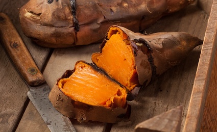 Baked sweet potatoes ready for a sweet potato cake recipe.