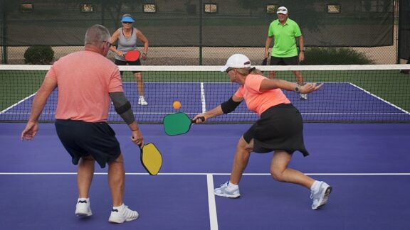 Seniors playing pickleball