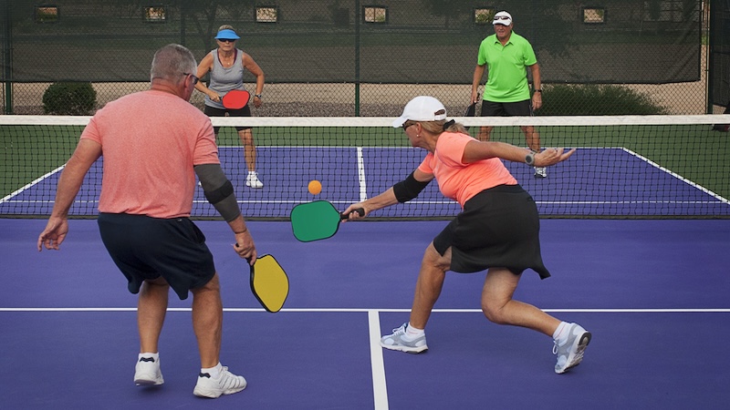 Seniors playing pickleball