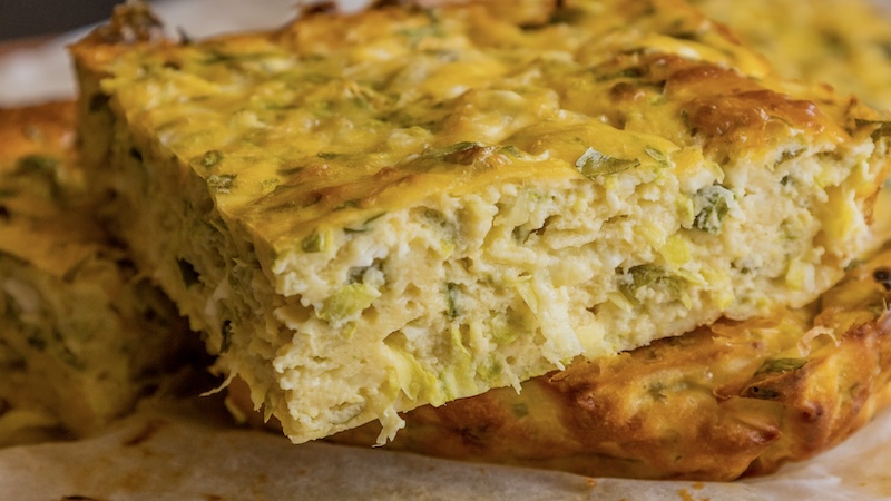 A piece of crustless quiche