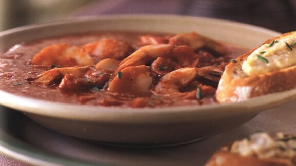 A bowl of shrimp and scallop stew