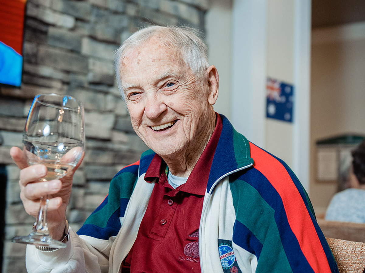 English Meadows Berryville Man Enjoying Drink