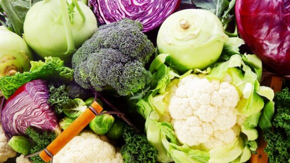An assortment of healthy and nutritious winter vegetables like broccoli and beets.