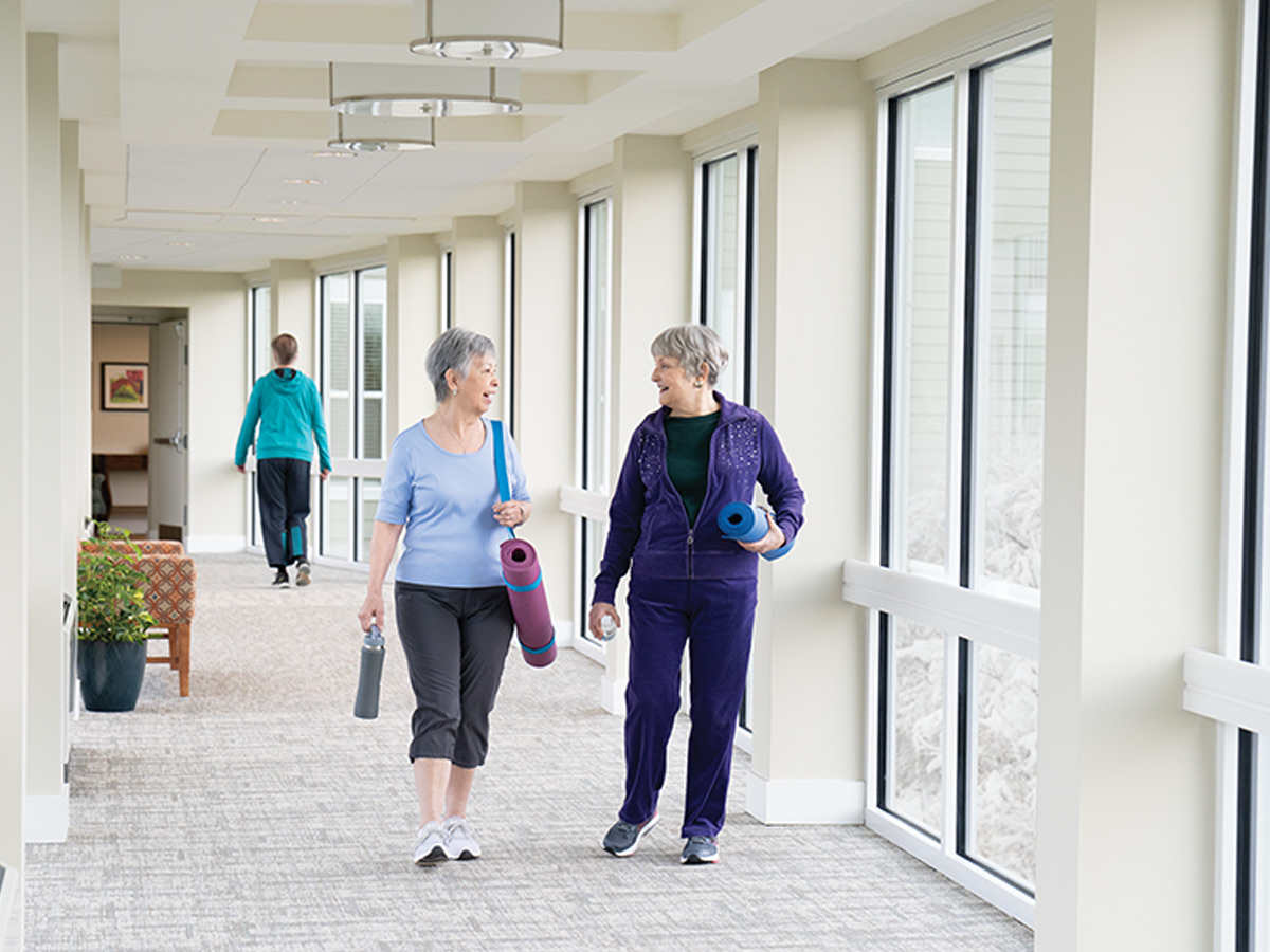 Ashby Ponds Ladies Walking Down Hallway
