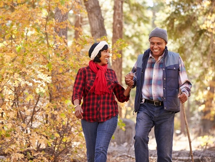 Couple walking outdoors.