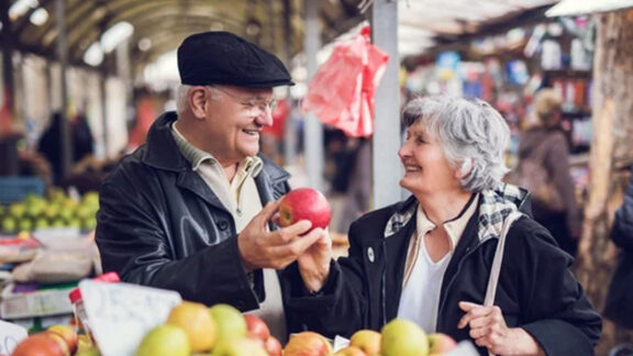 Grasslands Estates Senior Couple Buying Apples