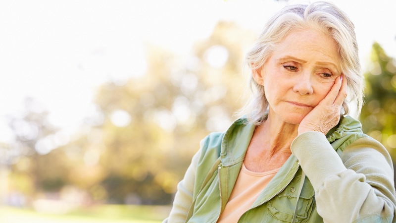 A woman disturbed because she's experiencing confusion over retirement plans