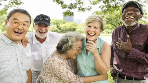 A group of happy seniors practicing successful aging.