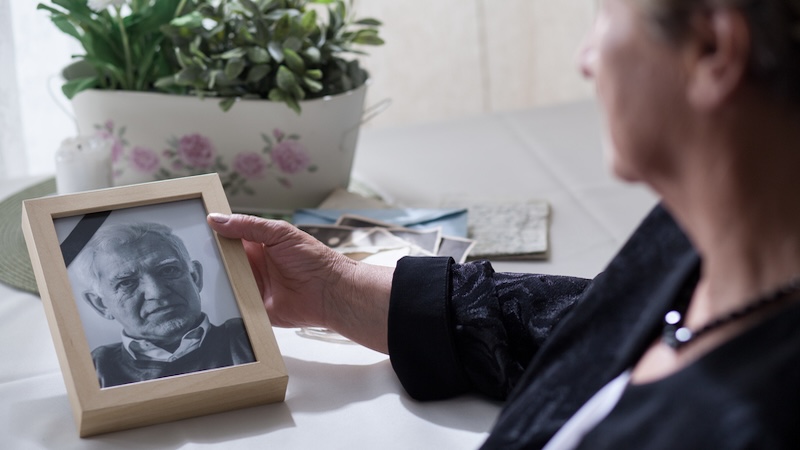 Old photos can help a grieving person stay connected after a loved one's death. Bialasiewicz