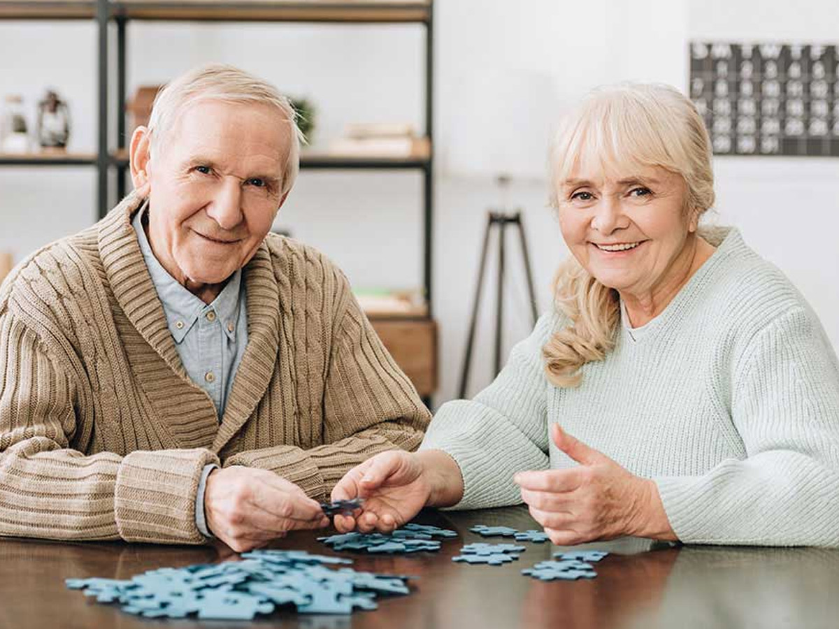Oakleaf Village of Lexington Couple with Puzzle