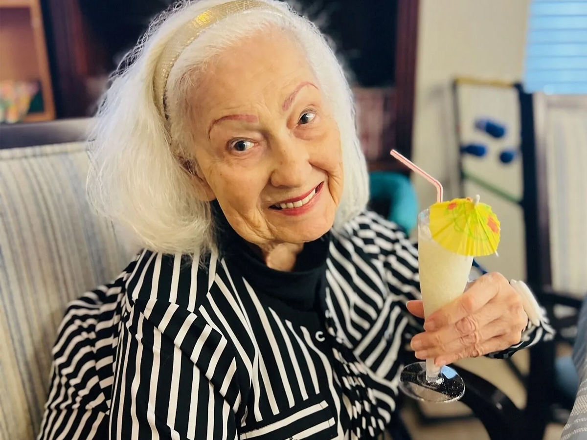 Oakleaf Village of Lexington Lady with Cocktail