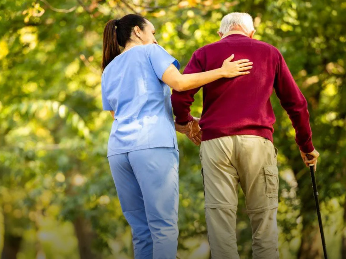 Preserve at Fairfield Glade Caregiver Helping Man Walk