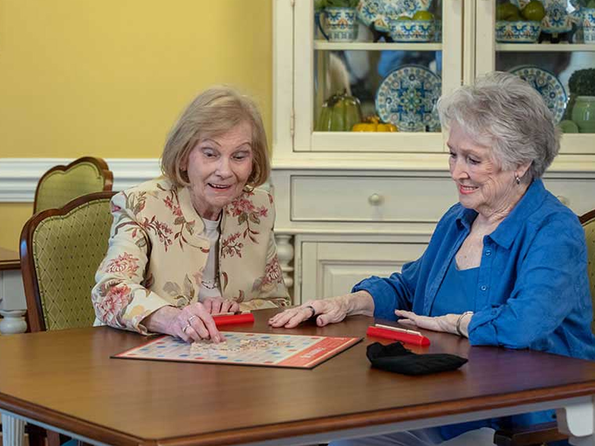 The Terrace of Brightmore of South Charlotte Ladies Playing Board Game