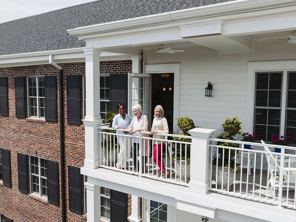 Bloomsbury at Hayes Barton Place Friends Standing on Balcony