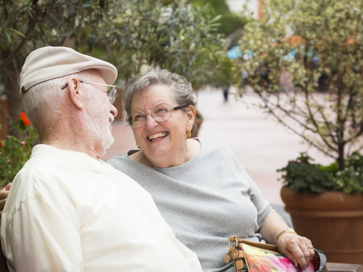 Waters Edge Couple Sitting Outdoor