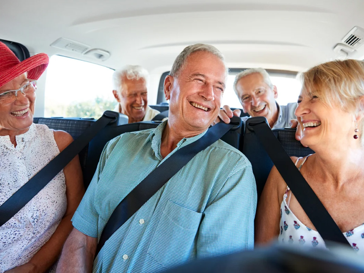 Waters Edge Friends Riding in Van