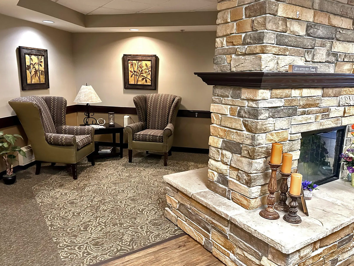 Vintage Hills of Indianola Sitting Area with Fireplace