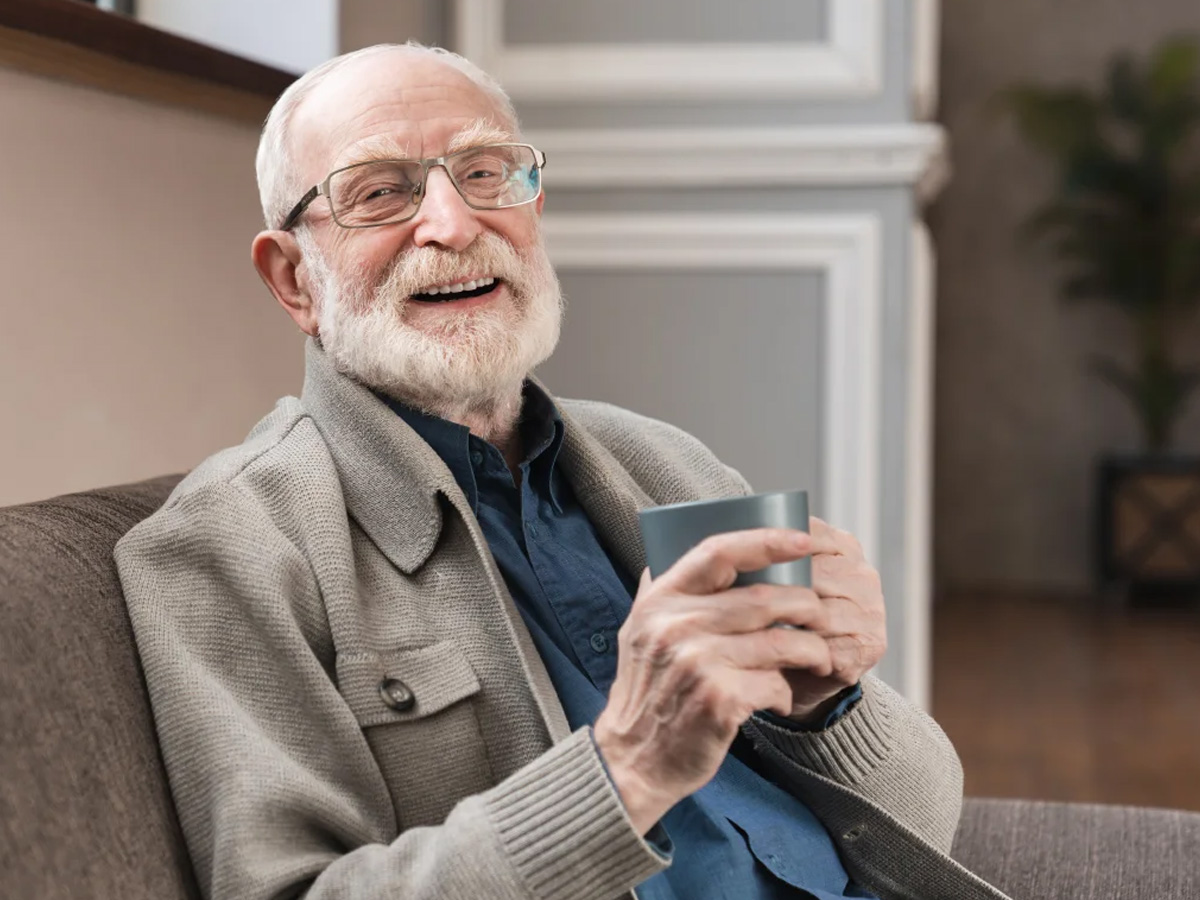 The Retreat at Sunbrook Man Enjoying Coffee