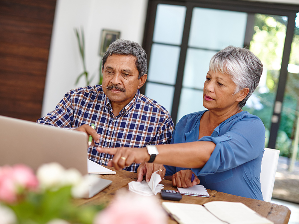 Price Services Group Eldery Couple on Computer