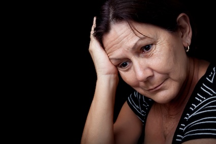 A lonely caregiver in a dark place.