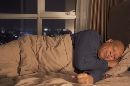 A man sleeping contently.