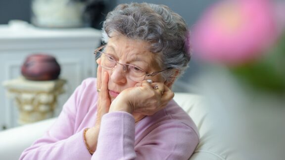 A deceased father's widow grieving.